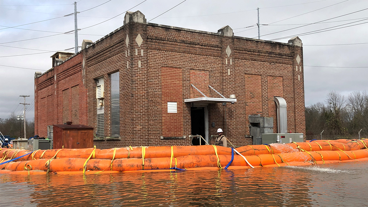 A tiger dam is keeping flood waters away from the control house at our south Jackson substation.